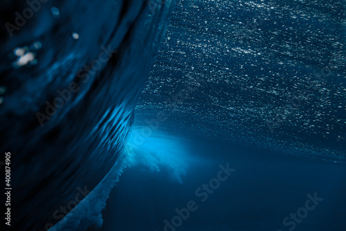 Underwater view of splashing sea wave photo