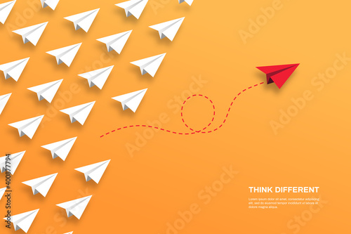 Think differently concept. Red airplane changing direction. Concepts: change, unique, trend, courage, innovation, different.