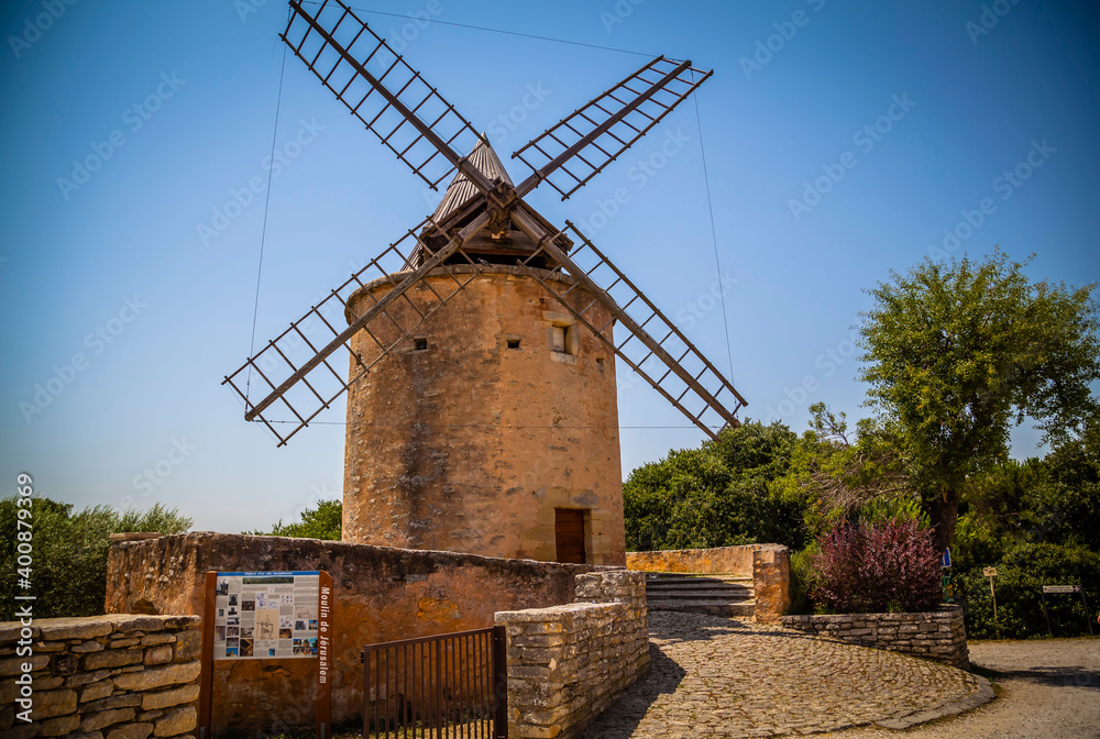 An old ancient windmill in the hills of Provence, France