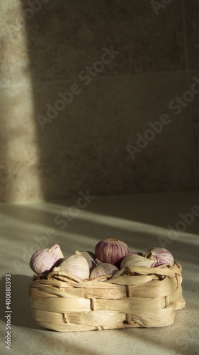 Garlic in basket to protect in coronatime photo