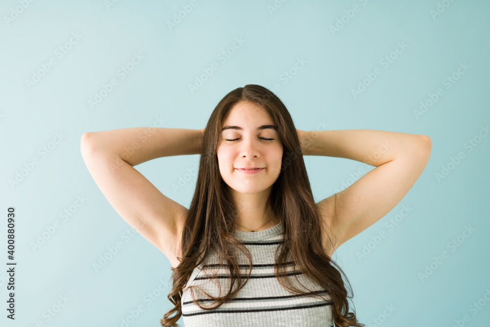 Caucasian woman with a calm and peaceful expression Caucasian woman with a calm and peaceful expression