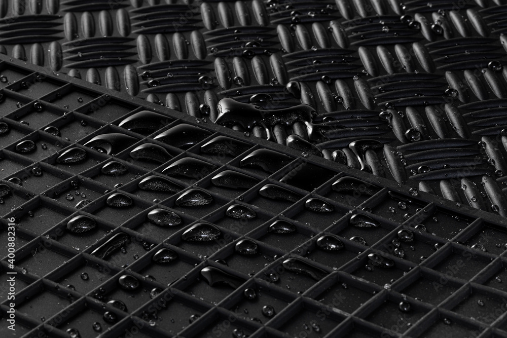 Details of high quality winter car mats with water drops - obrazy, fototapety, plakaty 