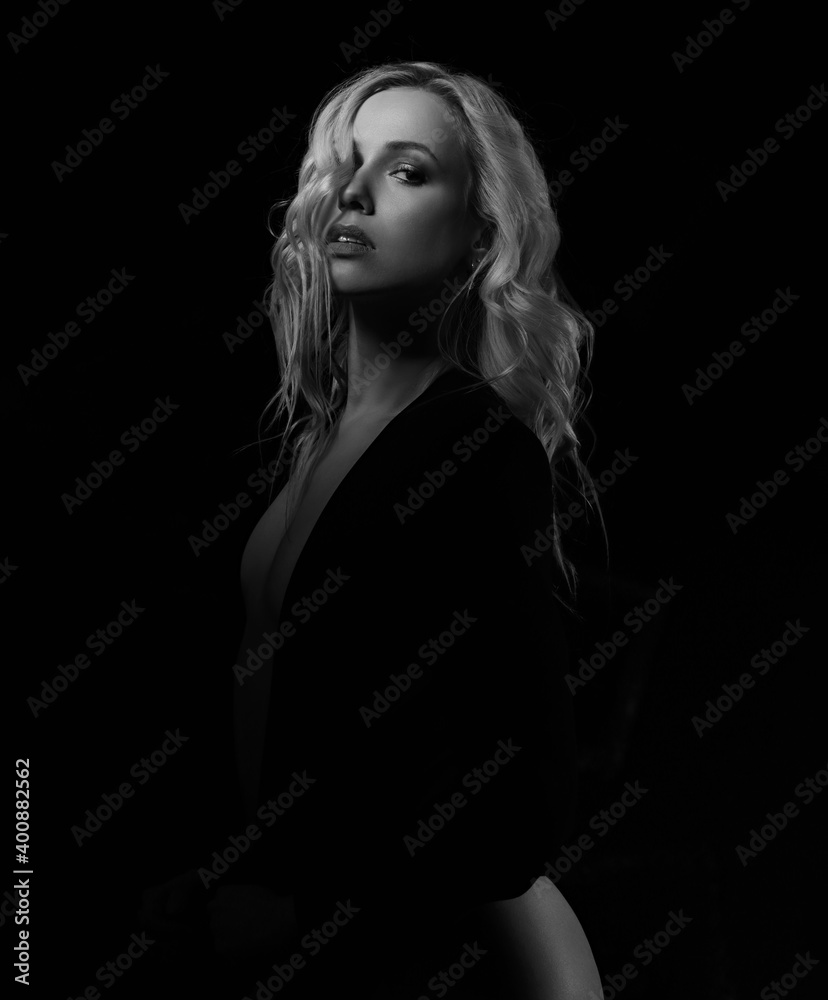 Beautiful hot saxy makeup woman with in black shirt, nude chest on dark black background with empty copy space. Closeup portrait. Art. Beautiful hot saxy makeup woman with in black shirt, nude chest on dark black background with empty copy space. Closeup portrait. Art.