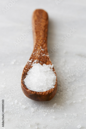 Wooden spoon with sea salt