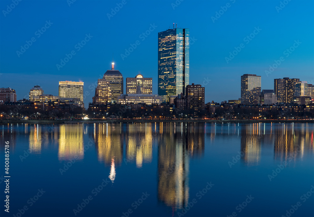 City skyline along Charles River at dusk City skyline along Charles River at dusk