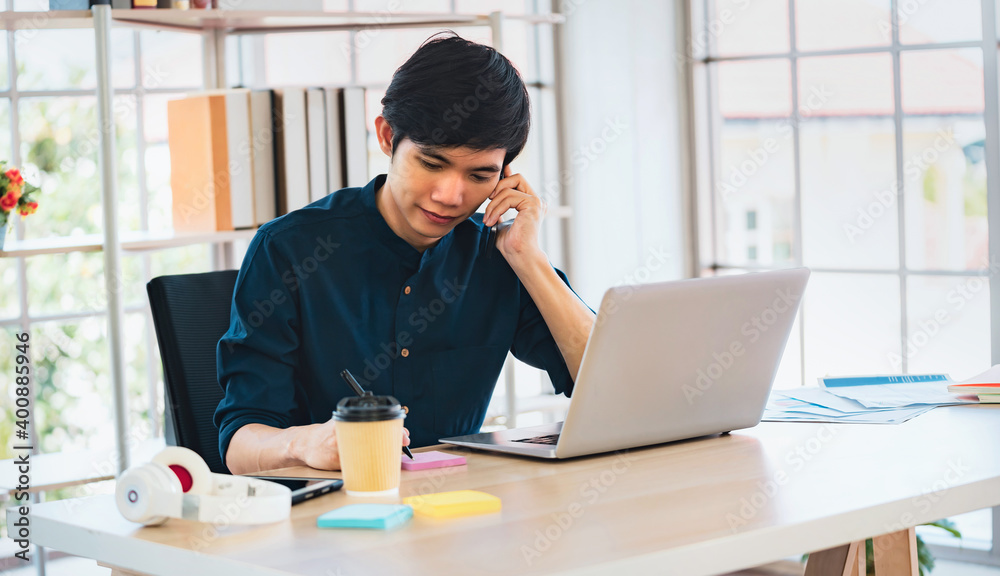 businessman using mobile with writing working in office businessman using mobile with writing working in office