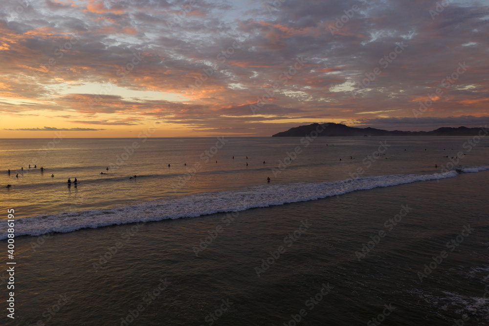 Ariel sunset of the surf in Tamarindo Costa Rica.