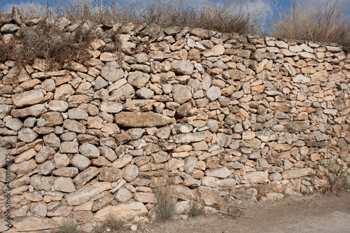 Rustic stone wall, Texture of old wall made of rocks