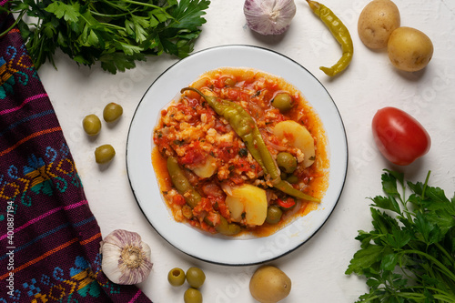 Mexican style cod called a la vizcaina on white background photo