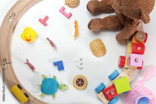 Big group of children's toys on white background, top view.