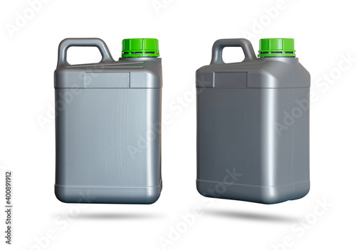 Gray plastic jerrycan with green lid standing sideways and diagonally on white background