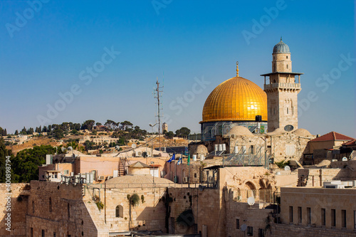Jerusalem slums ghetto district holy land urban landmark view with gold dome of ancient cathedral world famous travel destination site