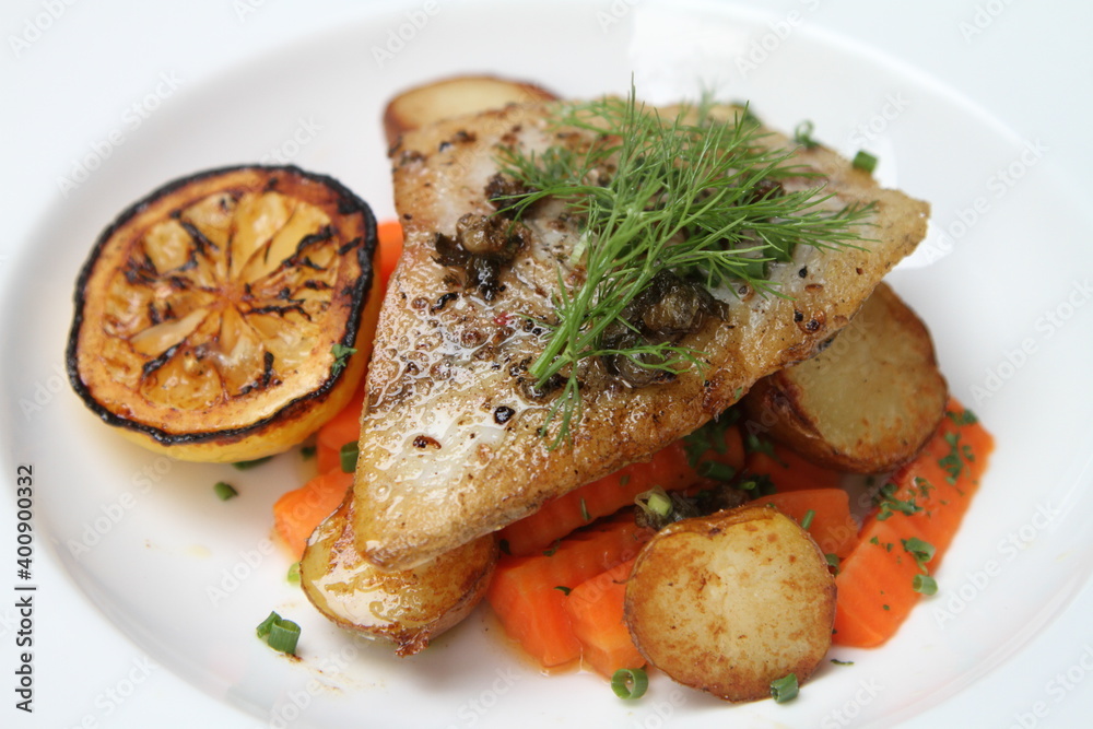 Pan fried barramundi with sweet carrots and fried potatoes