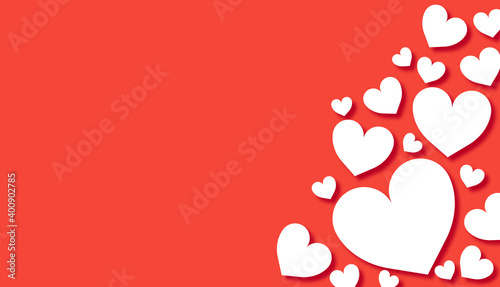 Fondo del Día de San Valentín con corazones blancos sobre una superficie roja. photo