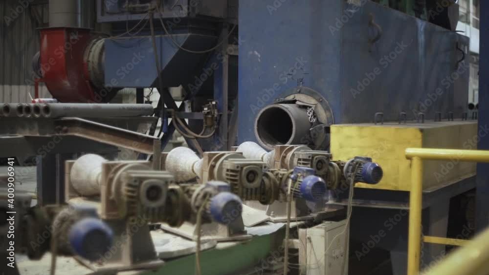 Metal pipe moves on pipeline in metal factory Metal pipe moves on pipeline in metal factory