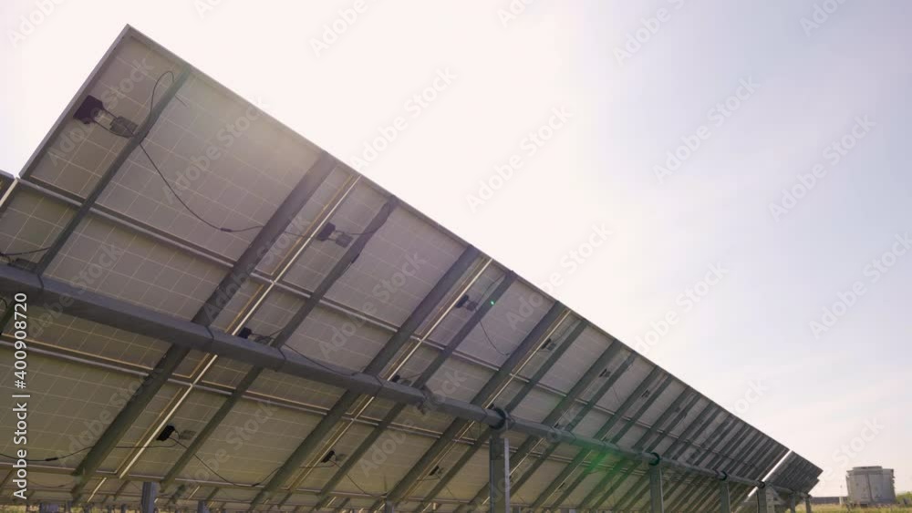 The solar panel(solar cell) with orange grass on foreground, Alternative energy to conserve the world's power, photovoltaic module idea for clean electric production, green energy, renewable energy. The solar panel(solar cell) with orange grass on foreground, Alternative energy to conserve the world's power, photovoltaic module idea for clean electric production, green energy, renewable energy.