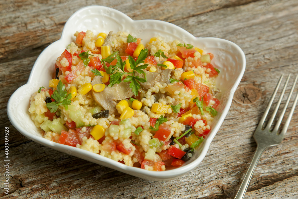 Millet salad with chopped fresh vegetables