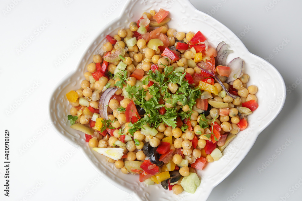 Chickpeas salad with chopped fresh vegetables Chickpeas salad with chopped fresh vegetables