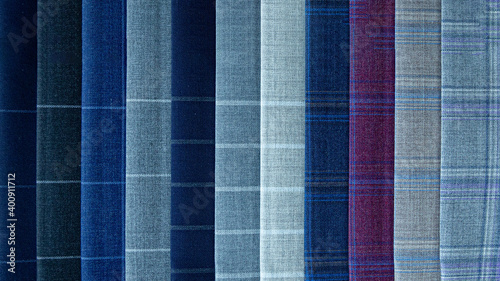Close up of the pattern of the fabric for cutting the suit. Fabric texture background.