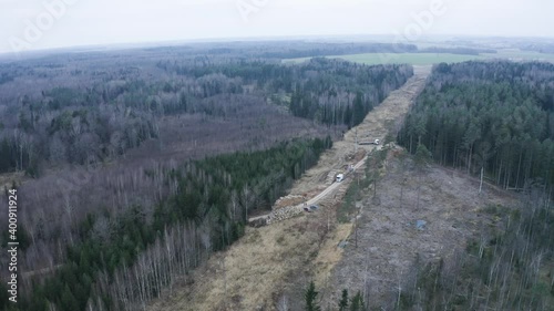 Aerial drone view flying over to log storing place. photo