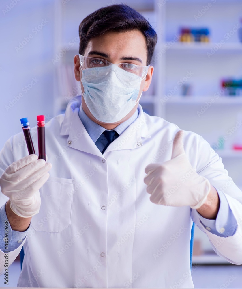 Lab assistant testing blood samples in hospital Lab assistant testing blood samples in hospital