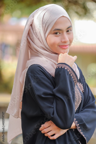 Portrait of Muslim beauty woman wearing hijab photo