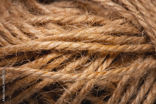Natural rope twine textured background close up plan. Fibers in a mess rustic style