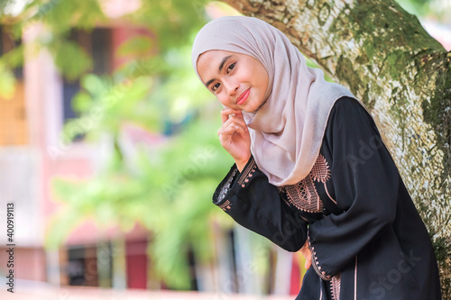 Portrait of Muslim beauty woman wearing hijab photo