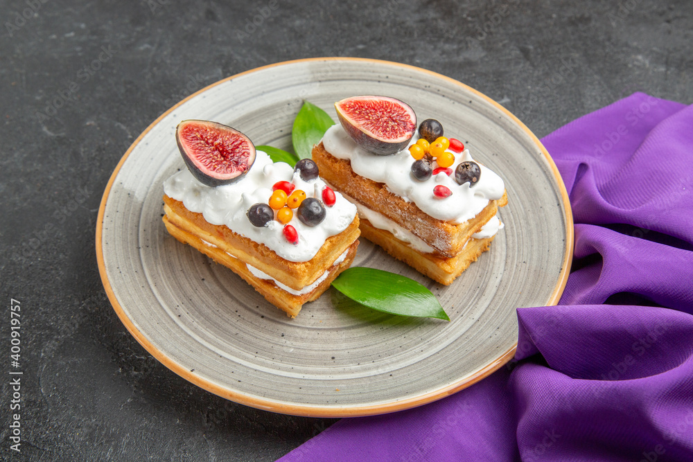 front view yummy waffle cakes with fruits on dark background cream sugar dessert cake sweet photo front view yummy waffle cakes with fruits on dark background cream sugar dessert cake sweet photo