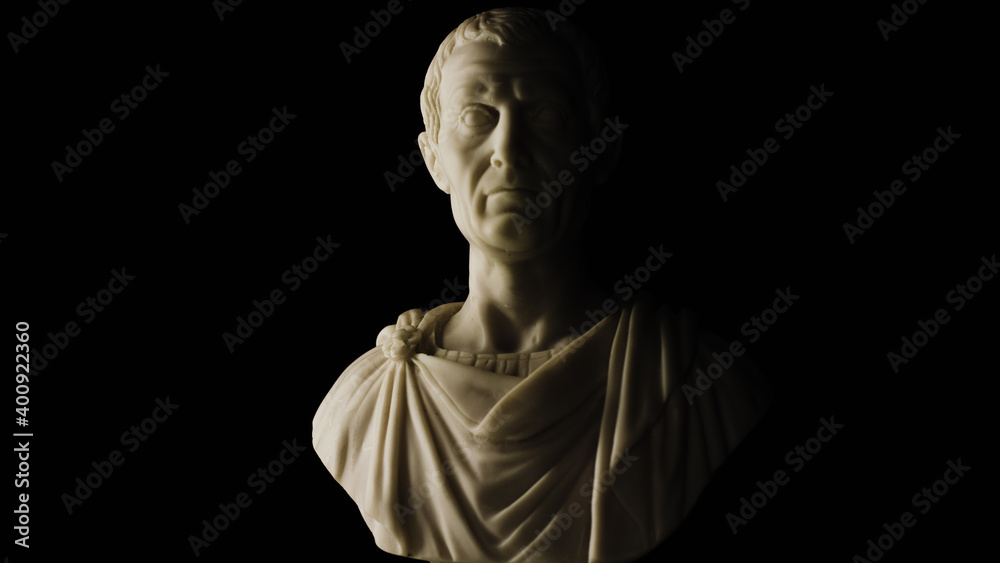 Julius Caesar marble statue bust on black background - obrazy, fototapety, plakaty 