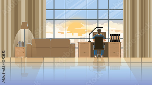 The freelance lifestyle concept of work hard over time and overwork. Working from home on desktop computer in house workplace. Alone in early morning sunrise. Professional occupation of online job.