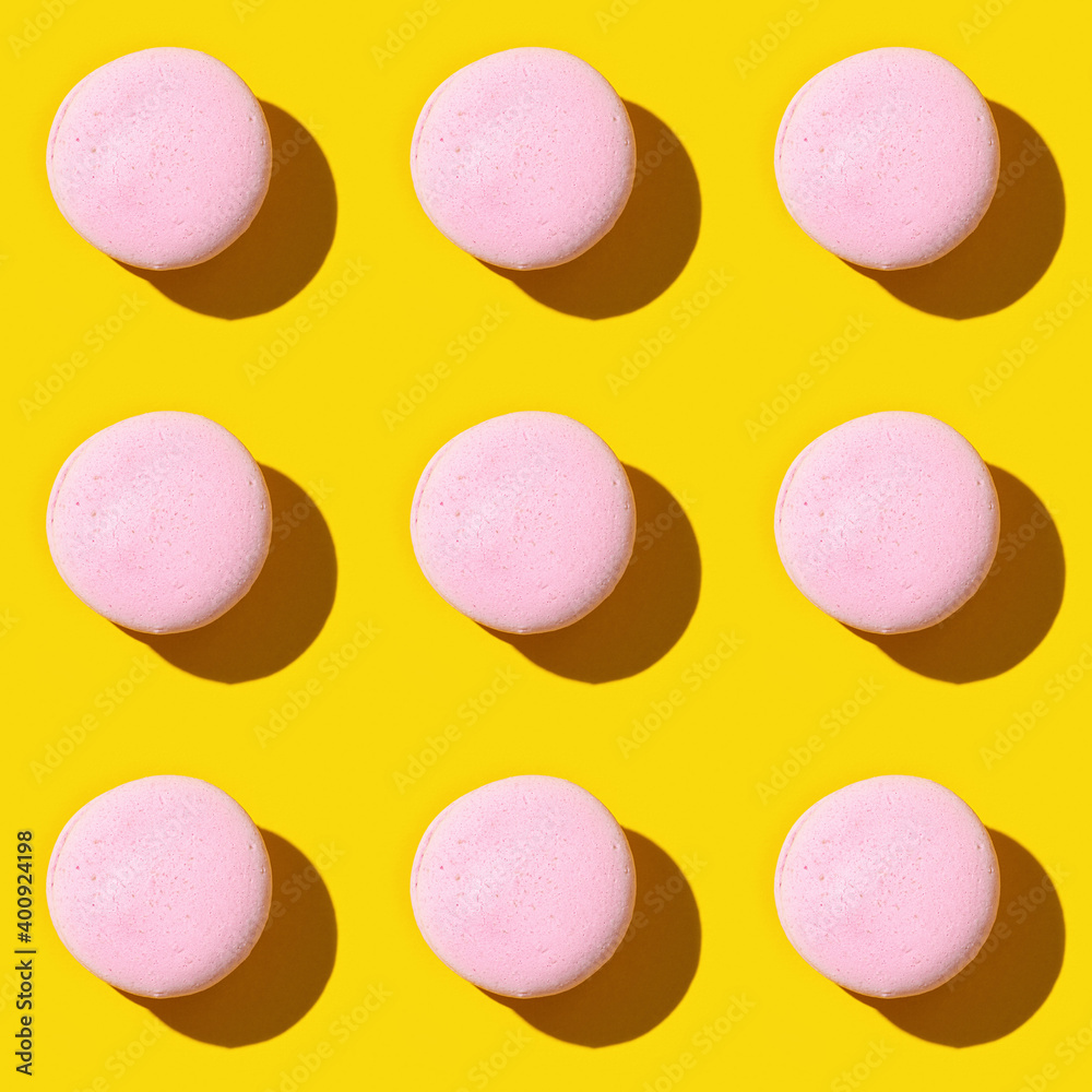 Seamless regular creative pattern of colorful french cookies macarons. Seamless regular creative pattern of colorful french cookies macarons.