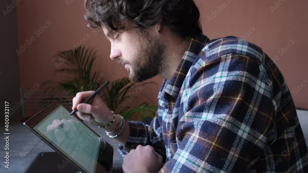 Professional designer is drawing a sketch of a storyboard. Close up shot