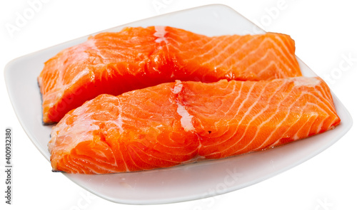 Raw salmon fillet. Isolated over white background