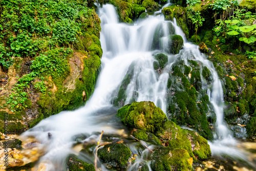 Fototapeta Naklejka Na Ścianę i Meble -  Beautiful scenic landscape of Isichenko waterfall in Kurdzhips Gorge in Caucasus mountains by Mezmai at summer, Russia