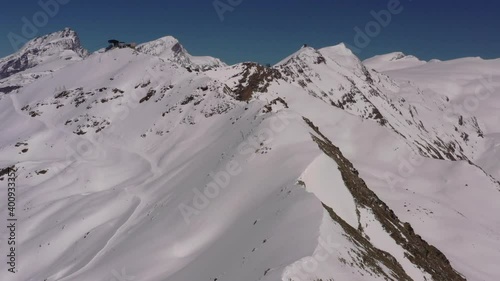 High definition drone aerial video flying high over Swiss Alps near Zermatt, Switzerland.