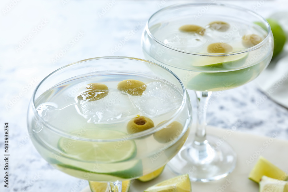 Glasses of fresh martini on table, closeup Glasses of fresh martini on table, closeup