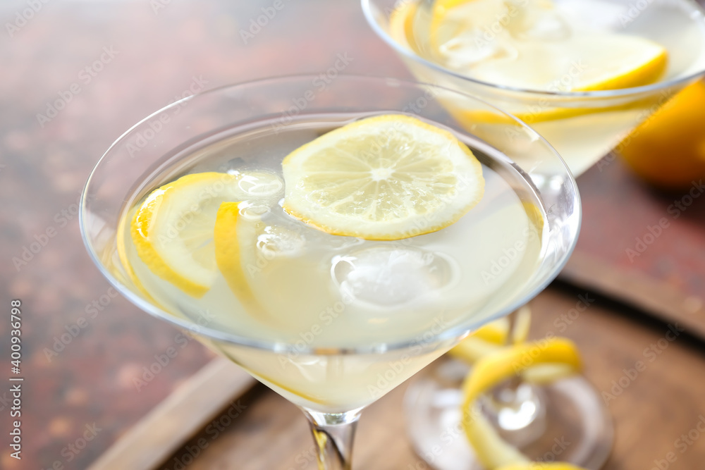 Glasses of fresh martini on table, closeup Glasses of fresh martini on table, closeup