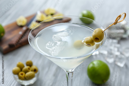 Glass of fresh martini on table