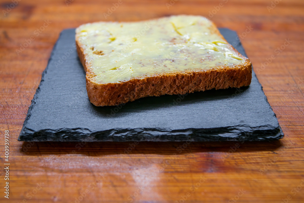 a delicious fresh bread with herb cream for the breakfast