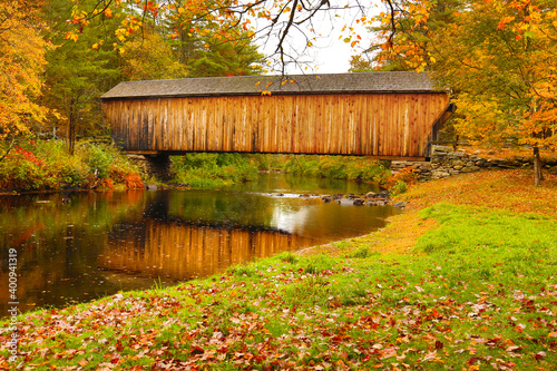 Corbin covered bridge over Sugar River in Newport, New Hampshire. photo