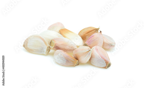 Garlic lobe isolated on white background.