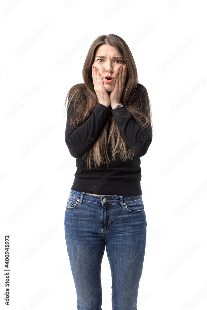 Shocked young beautiful woman posing on the white background. Shocked young beautiful woman posing on the white background.