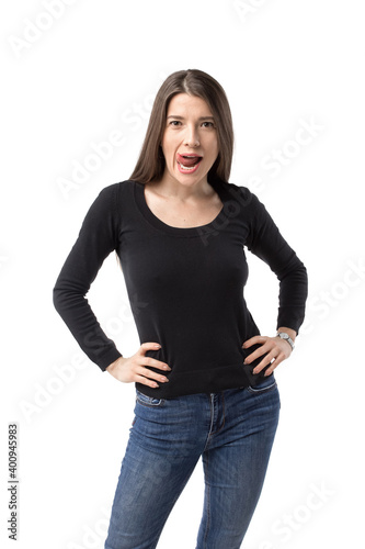Portrait of young caucasian playful woman showing her tongue in a seducing manner.