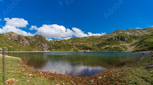 A lake in the mountains with blue sky