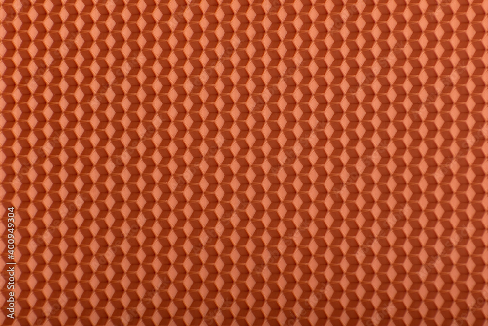 Fototapeta premium Honeycomb texture. Orange geometric abstract background. Template.
