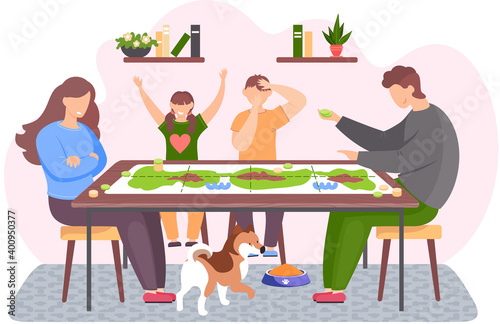 People spending evening time together. Kids joyfully raise hands. Puppy is walking under the table. Family is playing board game. Guy with green chips in his hands. Girl angrily looks at her husband