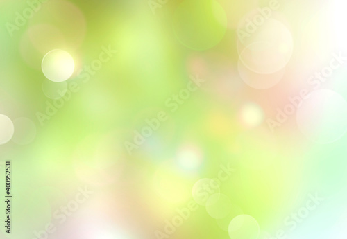 Green blurred bokeh background,abstract Easter backdrop.Spring natural texture.