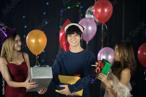 Happy Asian friends celebra...