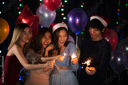 Happy Asian friends celebra...